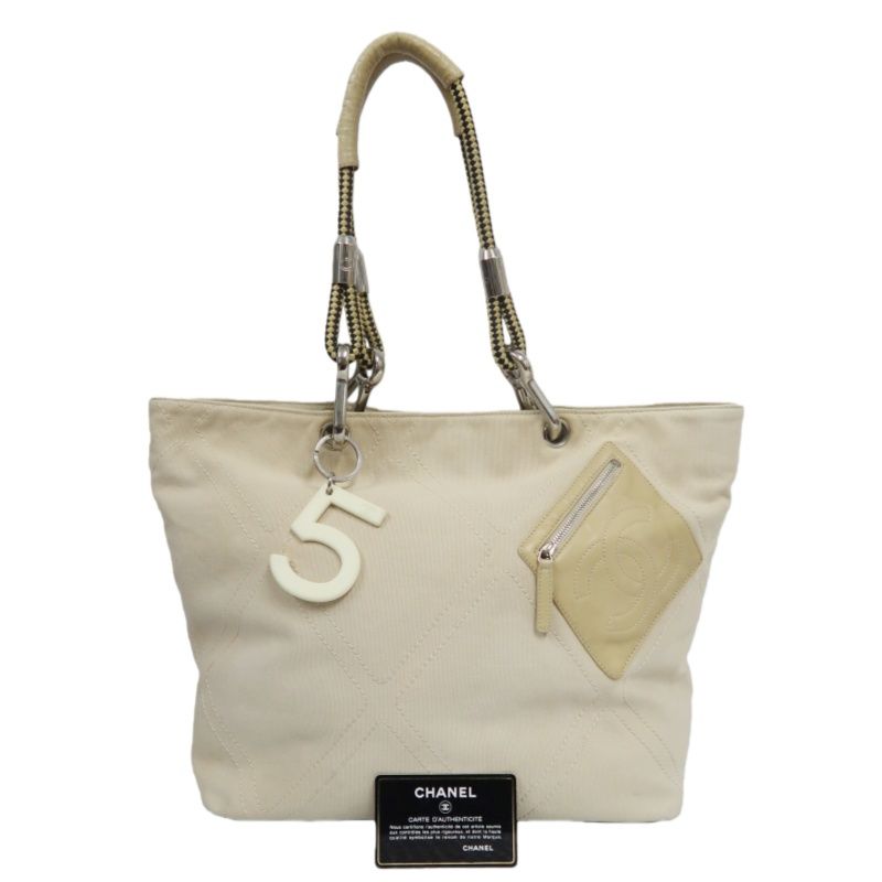 CHANEL Beige Canvas Tote Bag - W/ Guarantee Card & No.5 Charm