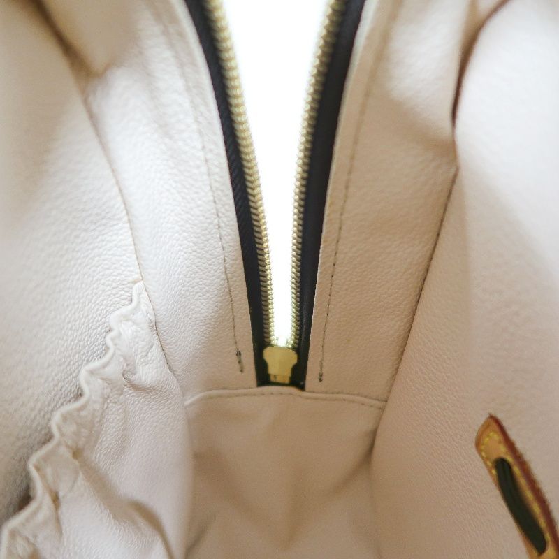 LOUIS VUITTON Spontini Monogram Handbag, Brown