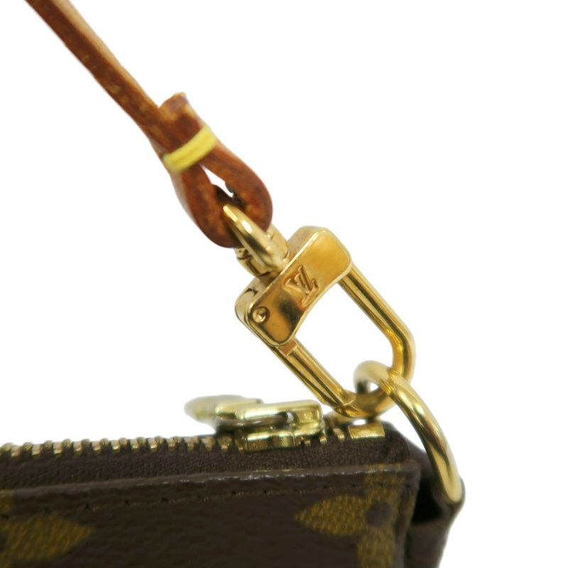 LOUIS VUITTON  Pochette Accessoires Monogram Pouch Handbag, Brown
