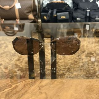 CHANEL Brown Resin Rimless Sunglasses With Gold Hardware, Comes With Original Outer Box, Inner Case And Two Dust Bags