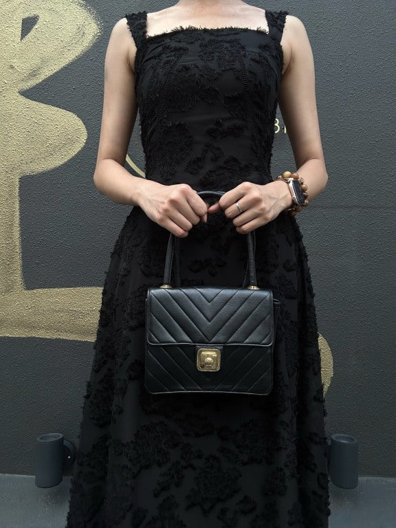 CHANEL Chevron Striped Black Lambskin Leather Flap Crossbody Bag With Gold Hardware