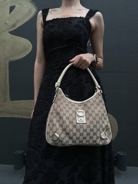 GUCCI GG Monogram Canvas Hobo Shoulder Bag Beige Brown Classic Pattern Light Tan Off White Leather Trim Gold Hardware Vintage Elegant Spacious Casual Daily Commute Bag