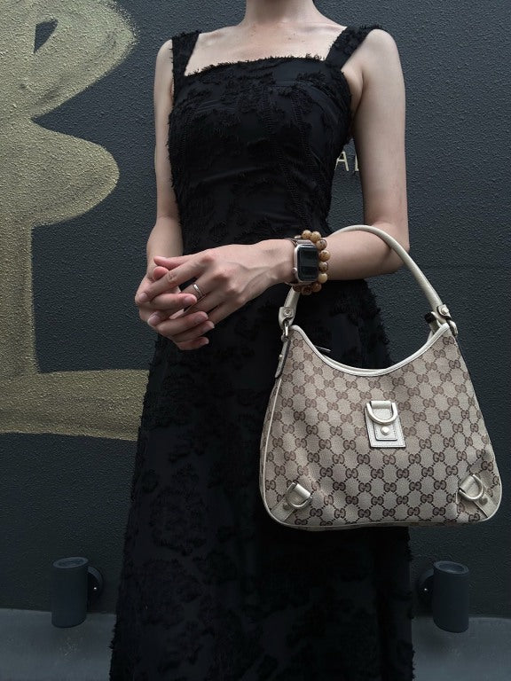 GUCCI GG Monogram Canvas Hobo Shoulder Bag Beige Brown Classic Pattern Light Tan Off White Leather Trim Gold Hardware Vintage Elegant Spacious Casual Daily Commute Bag