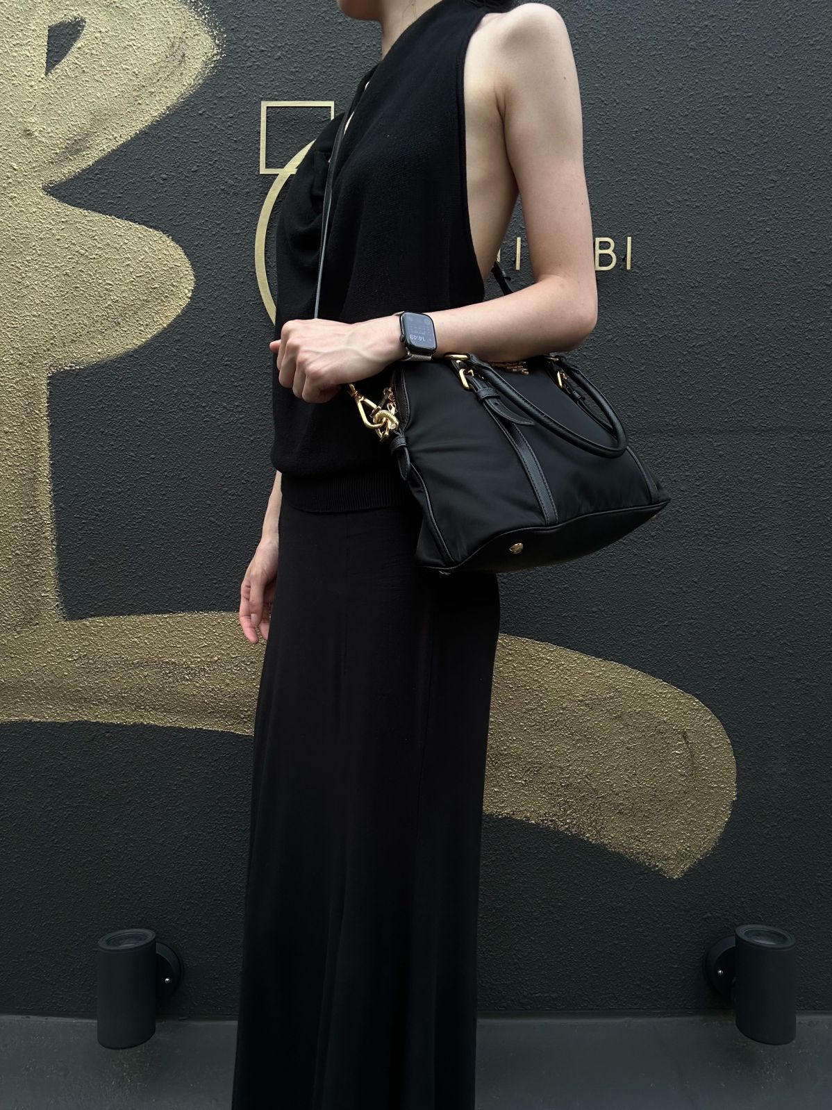 PRADA Tessuto Nylon Dome Handbag Black Nylon Saffiano Leather Trim Gold Hardware Spacious Work Bag with Detachable Shoulder Strap Classic Practical Design