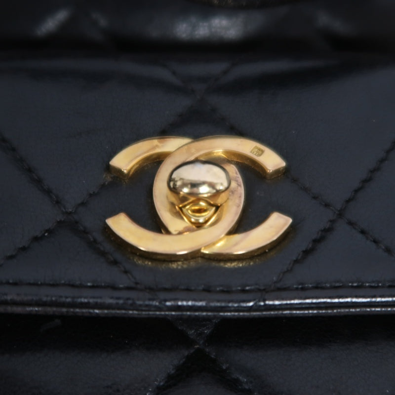 CHANEL Matelassé Lambskin Backpack Black Gold-Tone Hardware