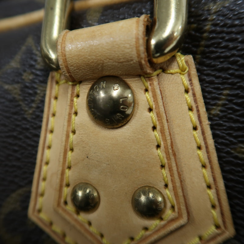 LOUIS VUITTON Monogram Manhattan PM Handbag Brown