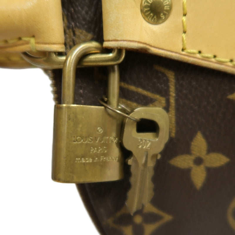 LOUIS VUITTON Monogram  Alma Dome Handbag  Brown Padlock And twoKeys