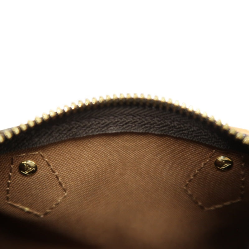 LOUIS VUITTON Monogram Speedy Nano Pvc Handbag With Shoulder Strap In Brown