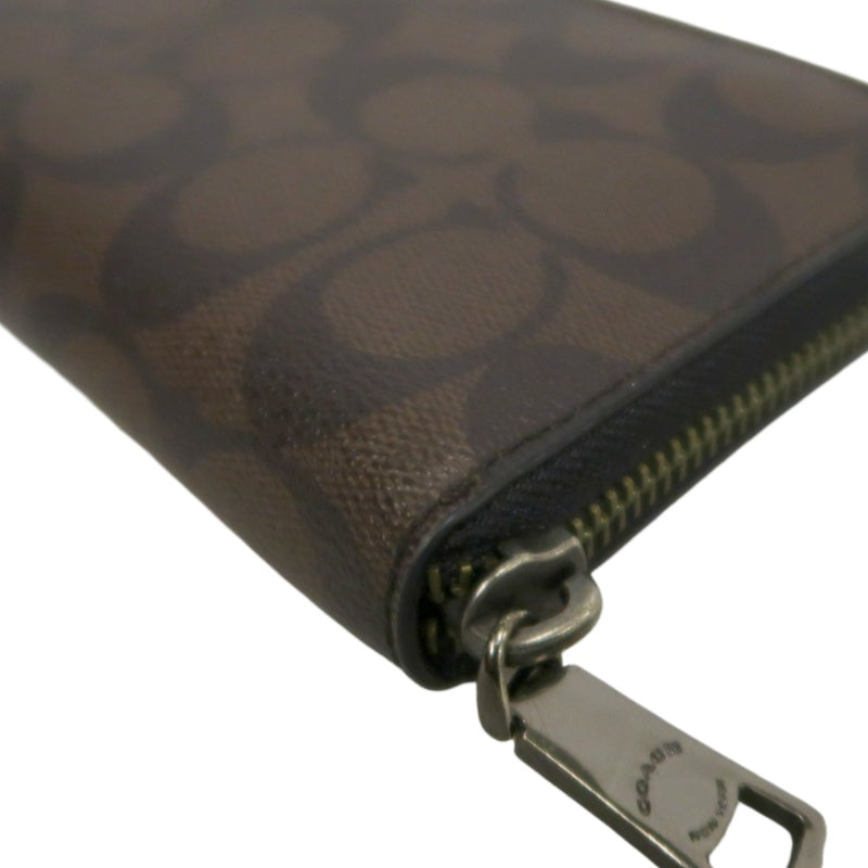 COACH Signature Pvc Long Wallet In Brown