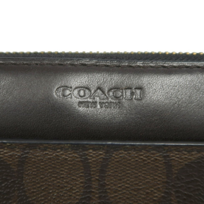 COACH Signature Pvc Long Wallet In Brown