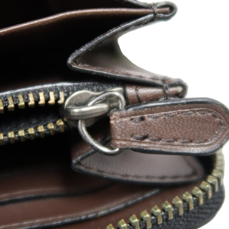 COACH Signature Pvc Long Wallet In Brown