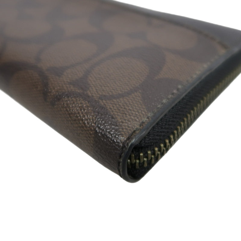 COACH Signature Pvc Long Wallet In Brown