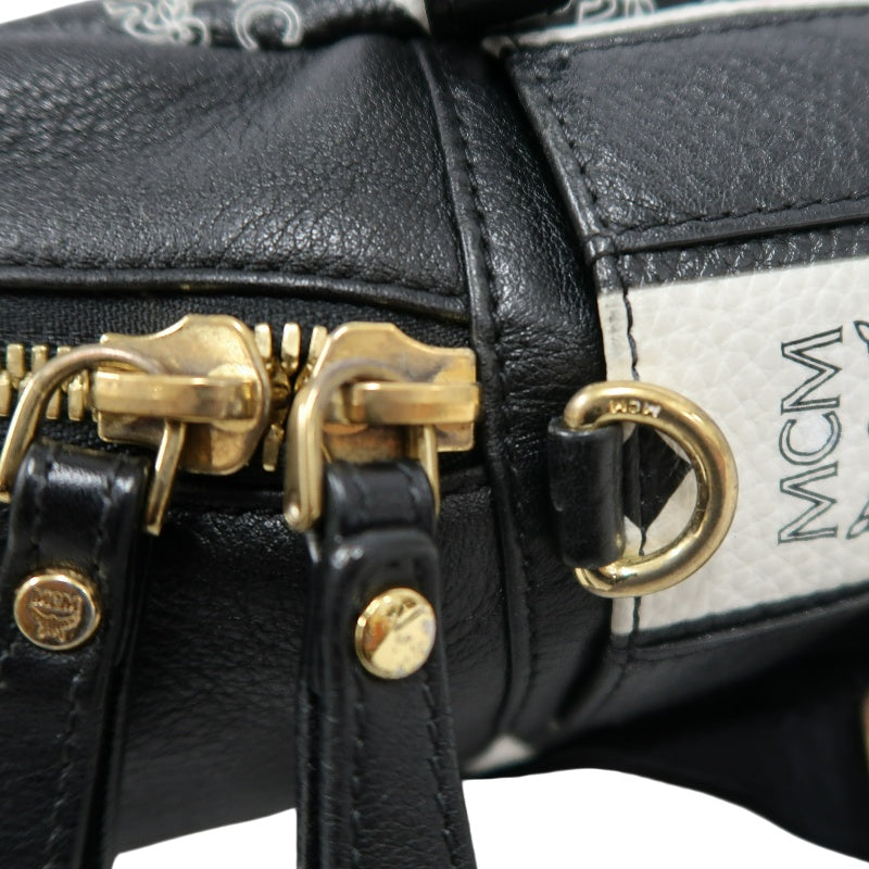 MCM Monogram Studded Black White PVC Backpack With Gold Hardware