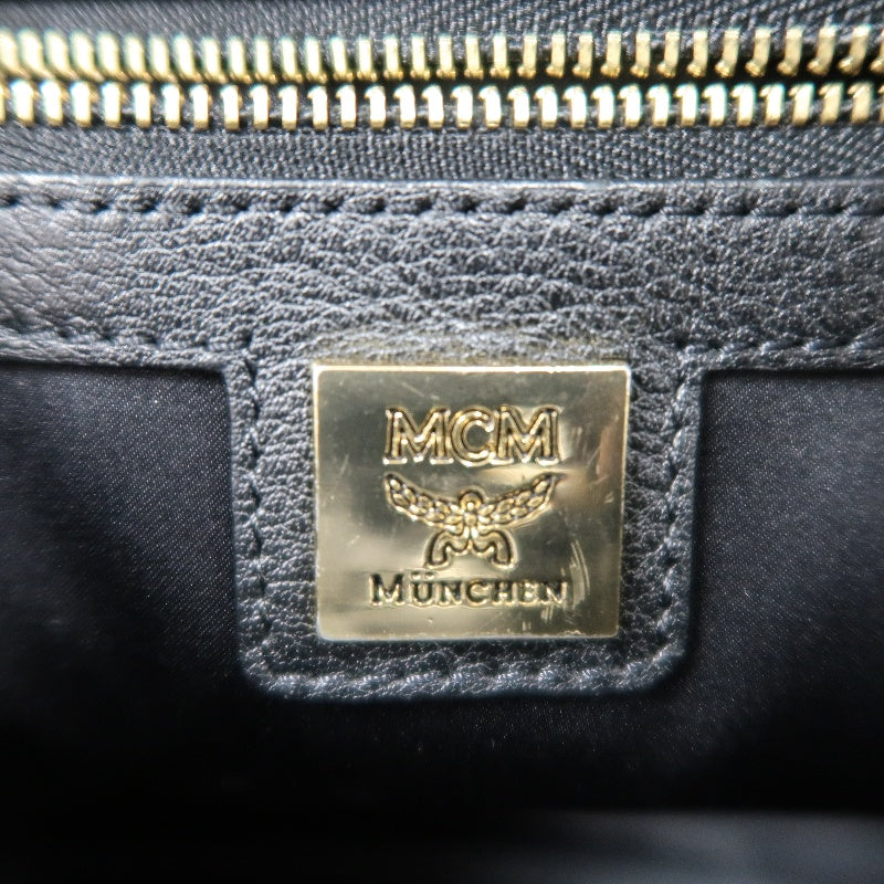 MCM Monogram Studded Black White PVC Backpack With Gold Hardware