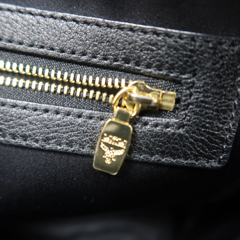 MCM Monogram Studded Black White PVC Backpack With Gold Hardware