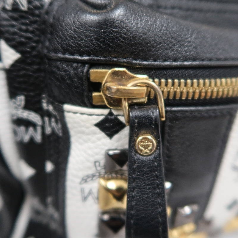 MCM Monogram Studded Black White PVC Backpack With Gold Hardware