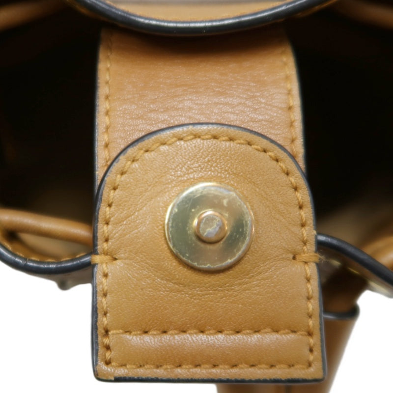 MCM Visetos Canvas Brown Studded Drawstring Bucket Shoulder Bag With Gold Hardware