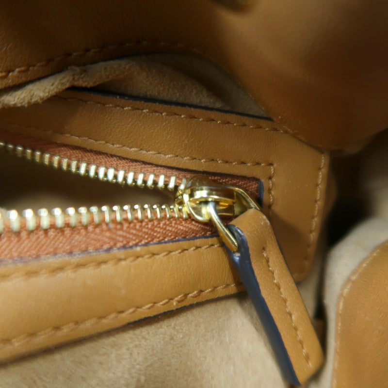 MCM Visetos Canvas Brown Studded Drawstring Bucket Shoulder Bag With Gold Hardware