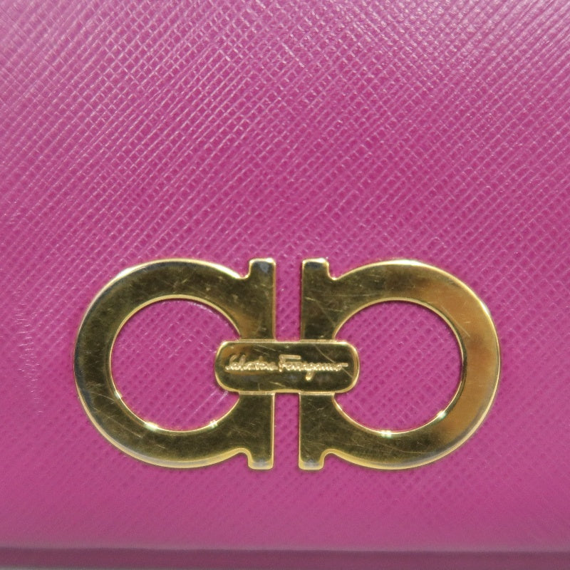 FERRAGAMO Pink PVC Long Bifold Wallet With Gold Hardware