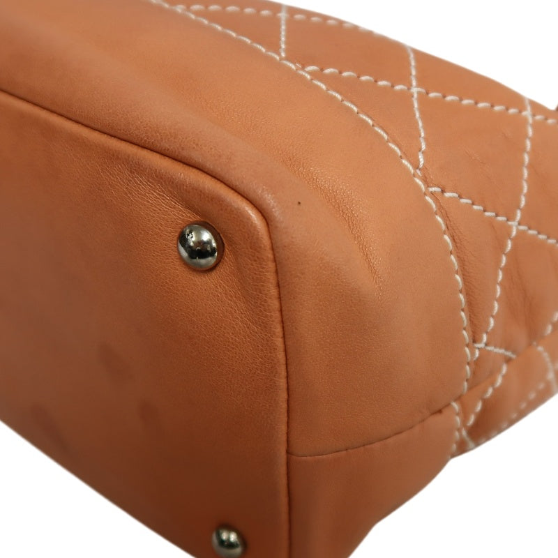 CHANEL Classic Matelasse Wild Stitch Orange Calfskin Leather Quilted Drawstring Bucket Shoulder Bag With Silver Hardware