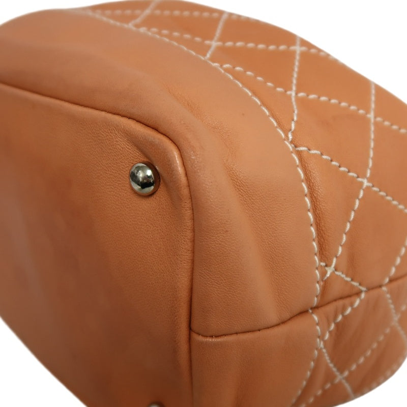 CHANEL Classic Matelasse Wild Stitch Orange Calfskin Leather Quilted Drawstring Bucket Shoulder Bag With Silver Hardware