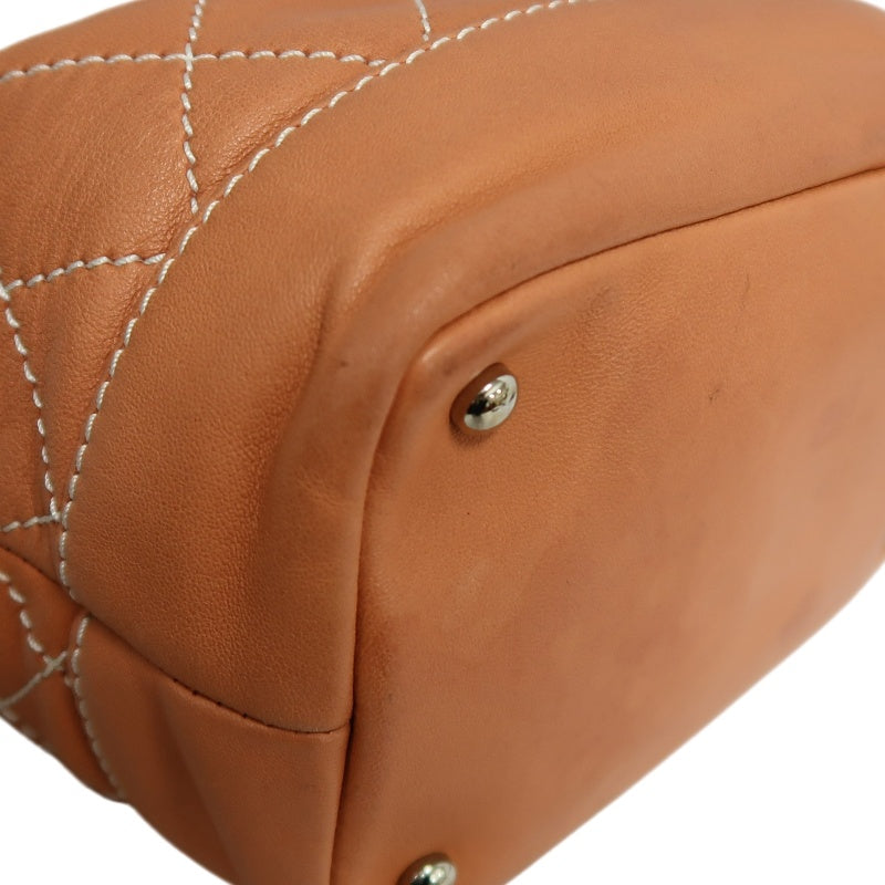 CHANEL Classic Matelasse Wild Stitch Orange Calfskin Leather Quilted Drawstring Bucket Shoulder Bag With Silver Hardware