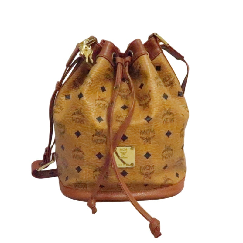 MCM Visetos Classic Monogram Camel Brown Drawstring Bucket Shoulder Crossbody Bag With Leather Trim, Gold Hardware