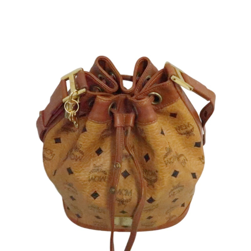 MCM Visetos Classic Monogram Camel Brown Drawstring Bucket Shoulder Crossbody Bag With Leather Trim, Gold Hardware