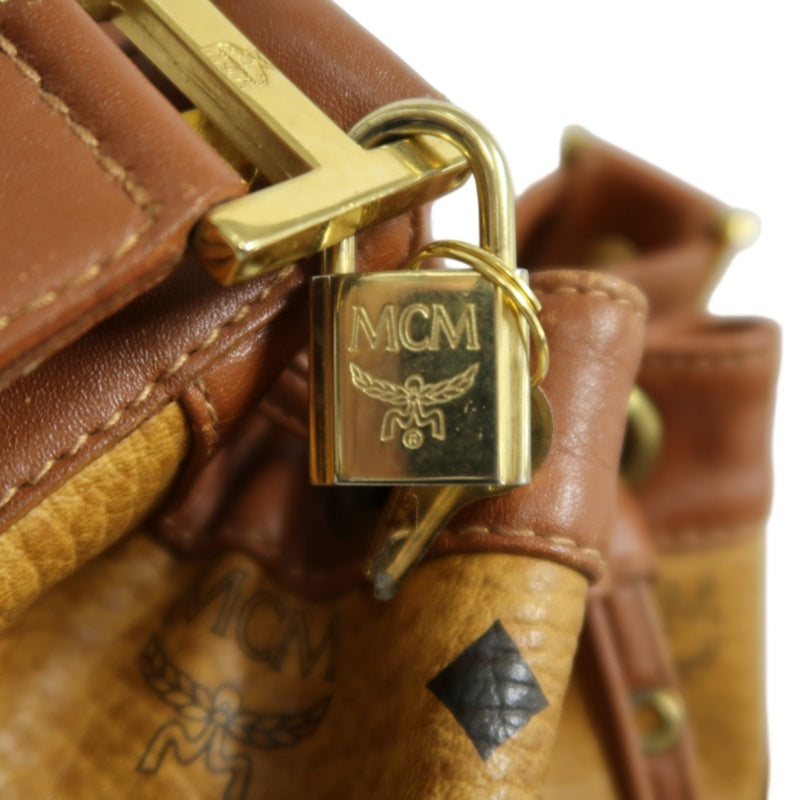 MCM Visetos Classic Monogram Camel Brown Drawstring Bucket Shoulder Crossbody Bag With Leather Trim, Gold Hardware