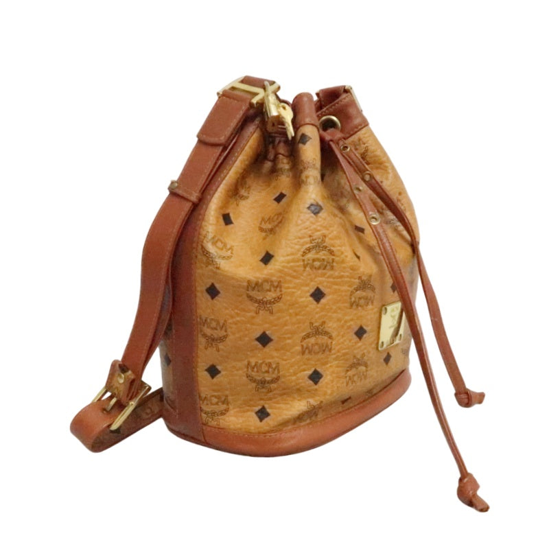 MCM Visetos Classic Monogram Camel Brown Drawstring Bucket Shoulder Crossbody Bag With Leather Trim, Gold Hardware