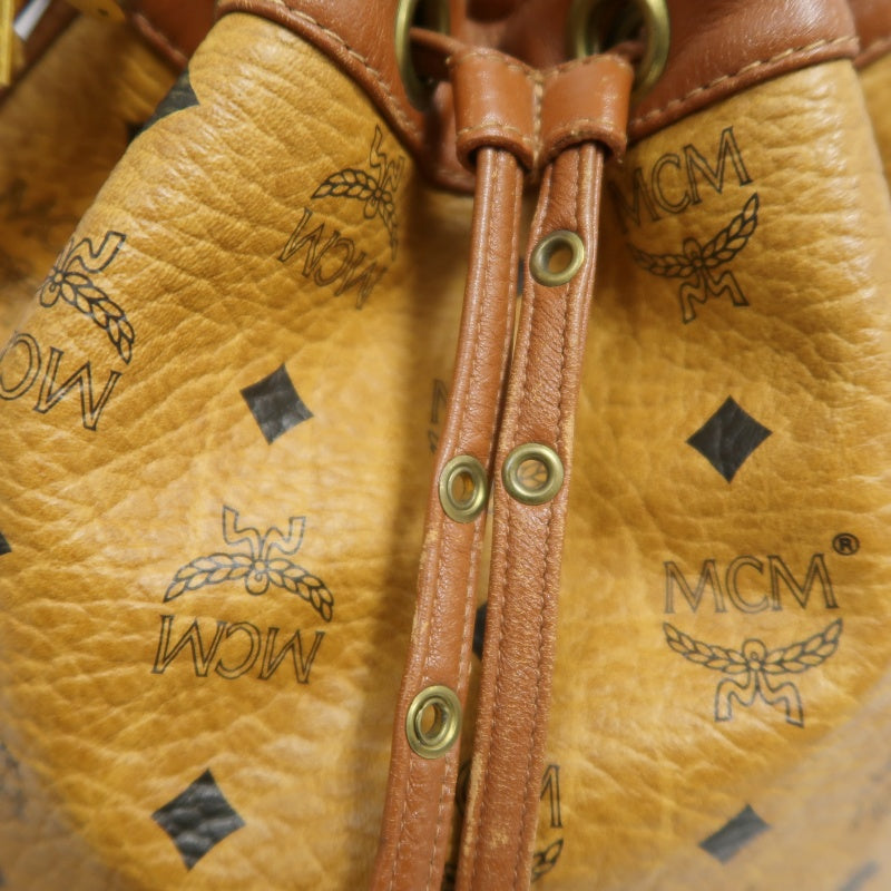 MCM Visetos Classic Monogram Camel Brown Drawstring Bucket Shoulder Crossbody Bag With Leather Trim, Gold Hardware