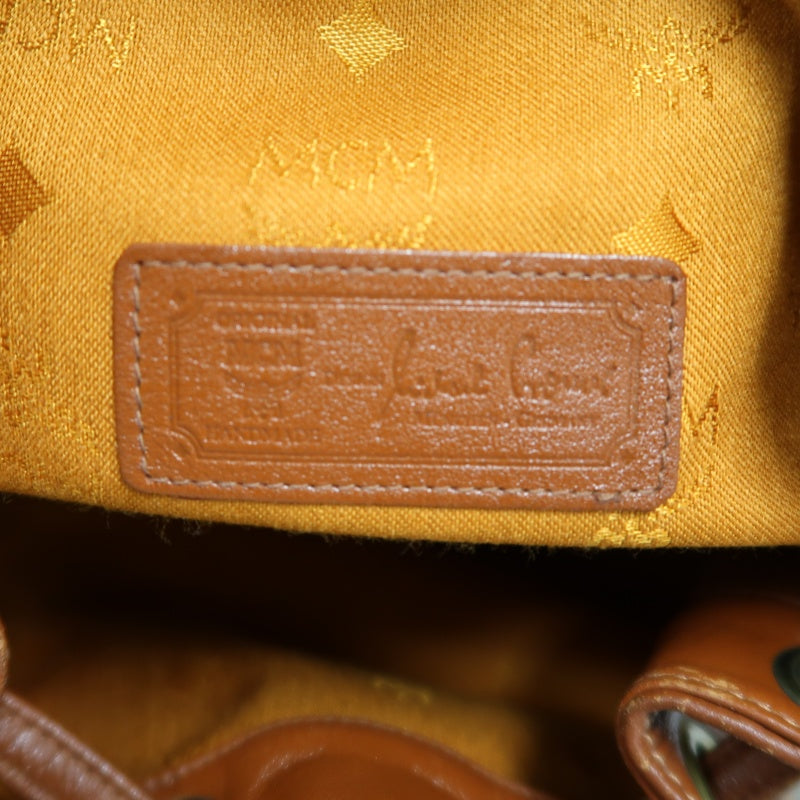 MCM Visetos Classic Monogram Camel Brown Drawstring Bucket Shoulder Crossbody Bag With Leather Trim, Gold Hardware