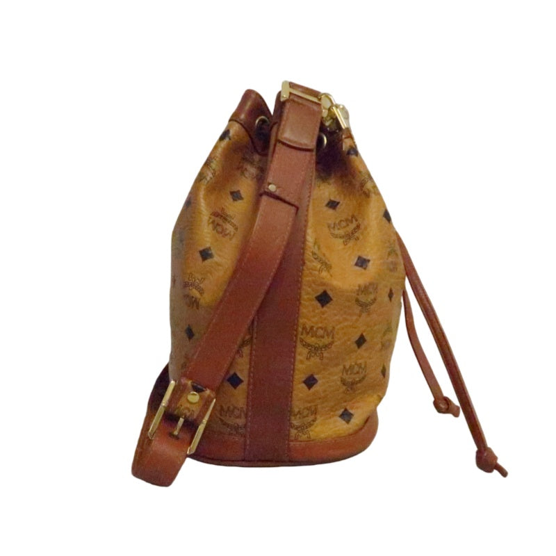 MCM Visetos Classic Monogram Camel Brown Drawstring Bucket Shoulder Crossbody Bag With Leather Trim, Gold Hardware