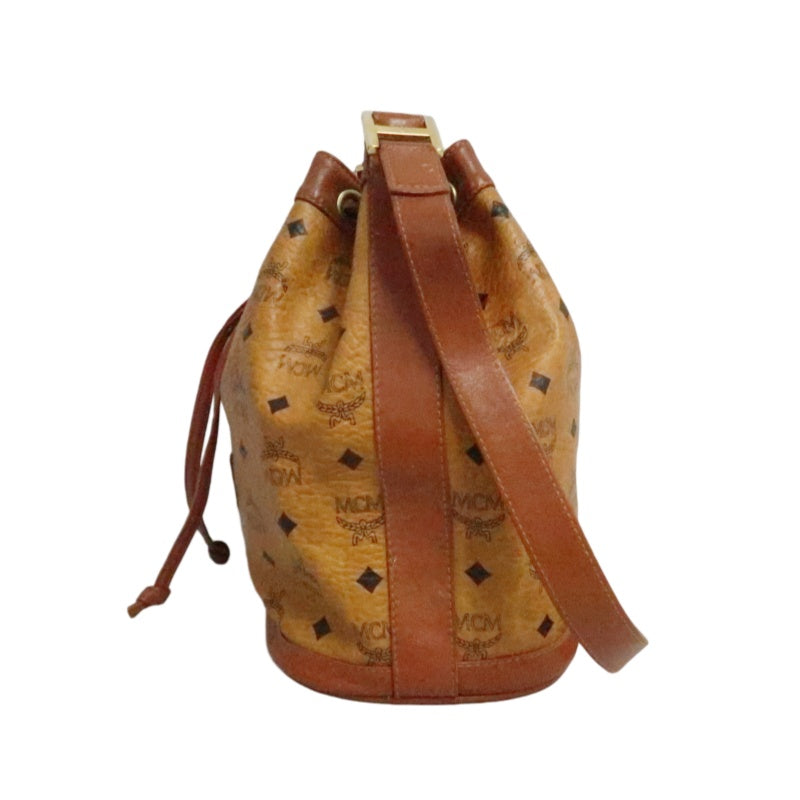 MCM Visetos Classic Monogram Camel Brown Drawstring Bucket Shoulder Crossbody Bag With Leather Trim, Gold Hardware