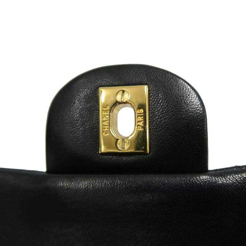 CHANEL Classic Maxi Jumbo Quilted Lambskin Double Flap Chain Shoulder Bag Black Soft Calfskin Gold CC Turnlock Hardware Spacious Capacity Iconic Vintage Timeless Classic Bag