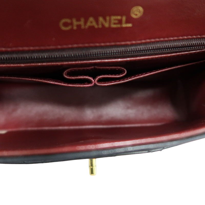 CHANEL Classic Maxi Jumbo Quilted Lambskin Double Flap Chain Shoulder Bag Black Soft Calfskin Gold CC Turnlock Hardware Spacious Capacity Iconic Vintage Timeless Classic Bag