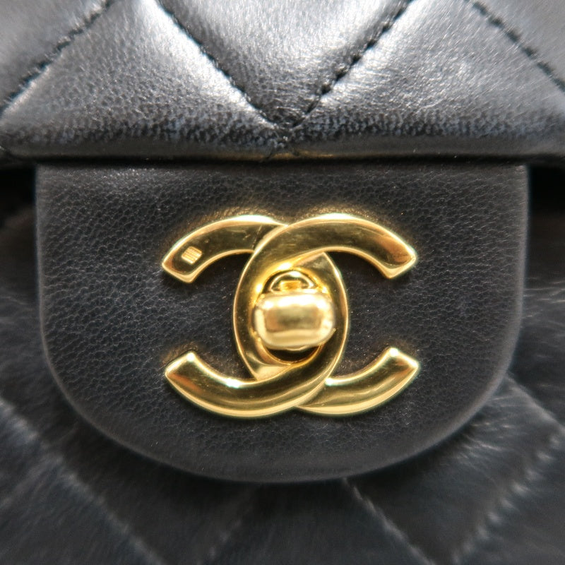 CHANEL Classic Maxi Jumbo Quilted Lambskin Double Flap Chain Shoulder Bag Black Soft Calfskin Gold CC Turnlock Hardware Spacious Capacity Iconic Vintage Timeless Classic Bag