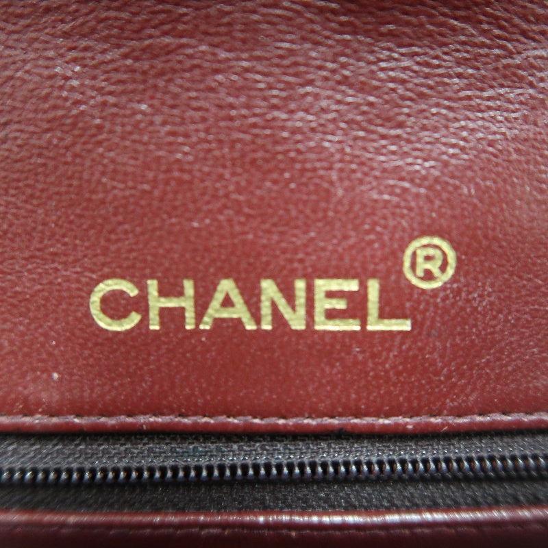 CHANEL Classic Maxi Jumbo Quilted Lambskin Double Flap Chain Shoulder Bag Black Soft Calfskin Gold CC Turnlock Hardware Spacious Capacity Iconic Vintage Timeless Classic Bag