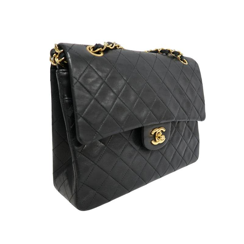 CHANEL Classic Maxi Jumbo Quilted Lambskin Double Flap Chain Shoulder Bag Black Soft Calfskin Gold CC Turnlock Hardware Spacious Capacity Iconic Vintage Timeless Classic Bag