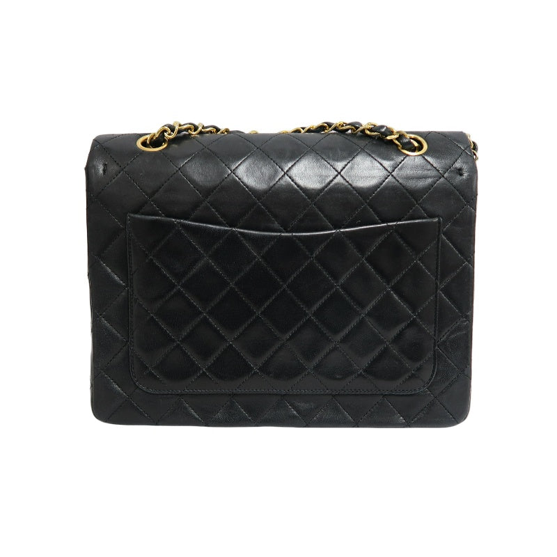 CHANEL Classic Maxi Jumbo Quilted Lambskin Double Flap Chain Shoulder Bag Black Soft Calfskin Gold CC Turnlock Hardware Spacious Capacity Iconic Vintage Timeless Classic Bag