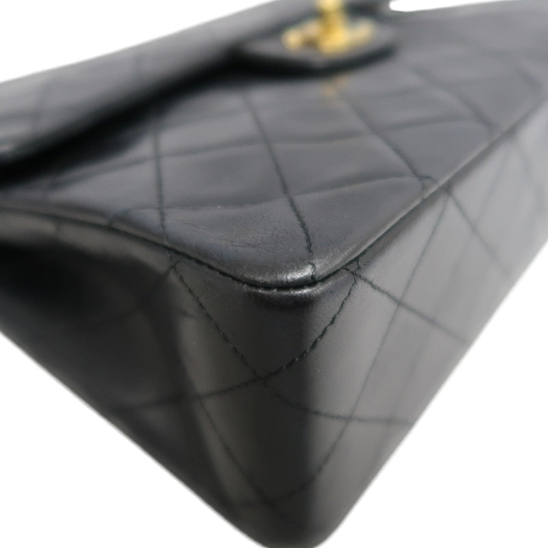 CHANEL Classic Maxi Jumbo Quilted Lambskin Double Flap Chain Shoulder Bag Black Soft Calfskin Gold CC Turnlock Hardware Spacious Capacity Iconic Vintage Timeless Classic Bag