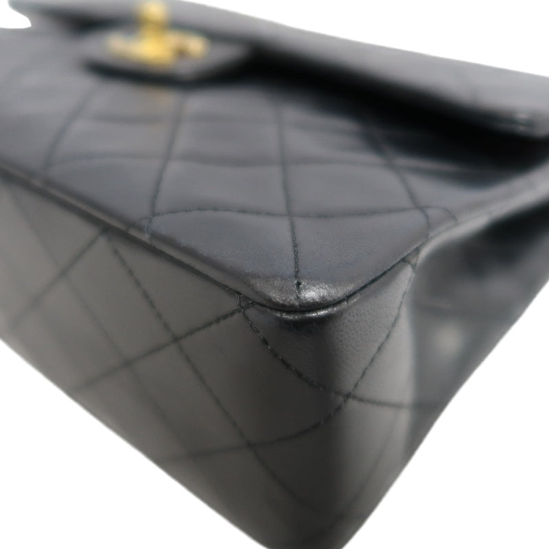CHANEL Classic Maxi Jumbo Quilted Lambskin Double Flap Chain Shoulder Bag Black Soft Calfskin Gold CC Turnlock Hardware Spacious Capacity Iconic Vintage Timeless Classic Bag