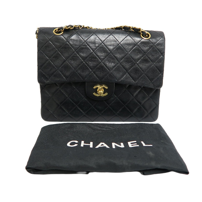 CHANEL Classic Maxi Jumbo Quilted Lambskin Double Flap Chain Shoulder Bag Black Soft Calfskin Gold CC Turnlock Hardware Spacious Capacity Iconic Vintage Timeless Classic Bag