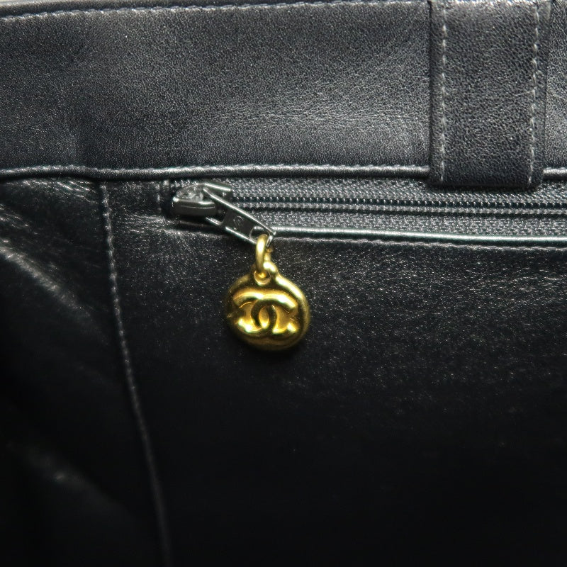 CHANEL XL Embossed CC Logo Lambskin Tote Bag Black Soft Calfskin Gold Hardware Chain Strap Spacious Vintage Iconic Classic Shopping Commute Bag