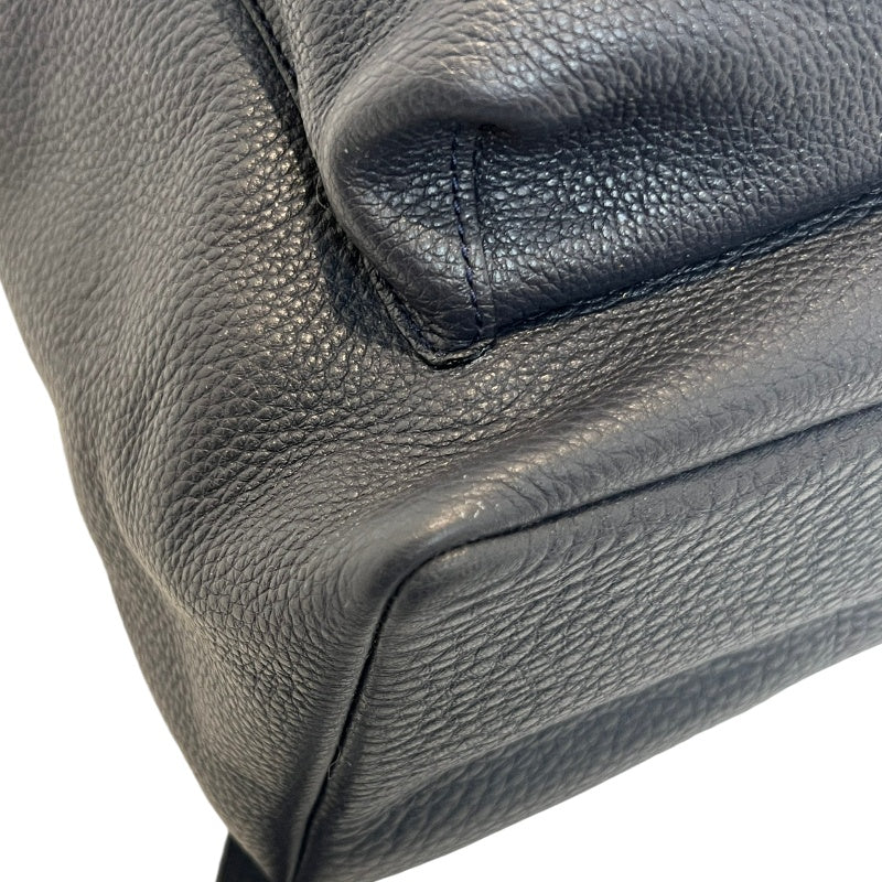 COACH Full Grain Pebbled Leather Backpack Black Calfskin Gold Hardware Front Twist Lock Pocket Spacious Casual Daily Commute Classic Design