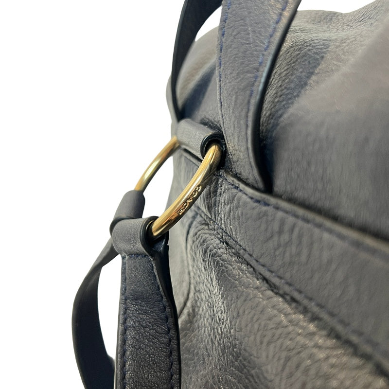 COACH Full Grain Pebbled Leather Backpack Black Calfskin Gold Hardware Front Twist Lock Pocket Spacious Casual Daily Commute Classic Design