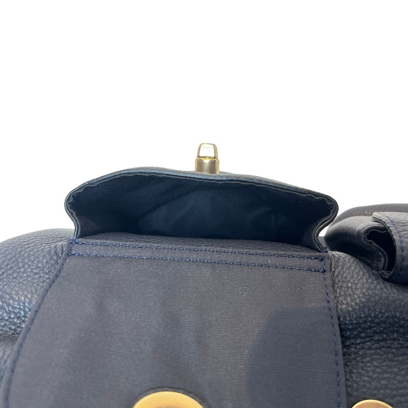 COACH Full Grain Pebbled Leather Backpack Black Calfskin Gold Hardware Front Twist Lock Pocket Spacious Casual Daily Commute Classic Design