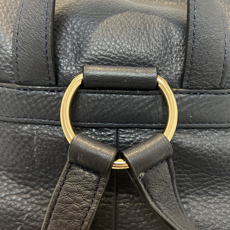 COACH Full Grain Pebbled Leather Backpack Black Calfskin Gold Hardware Front Twist Lock Pocket Spacious Casual Daily Commute Classic Design