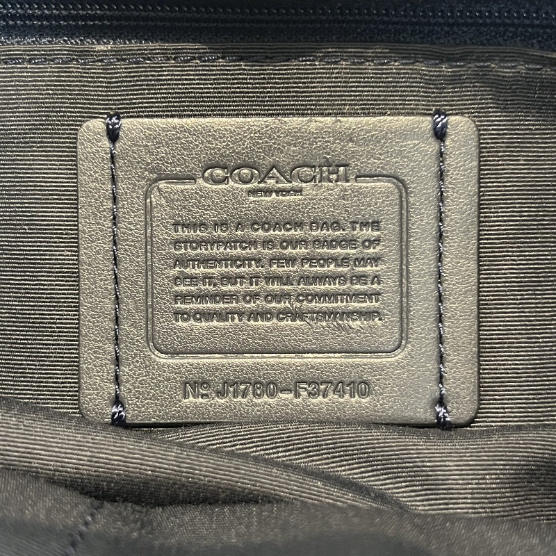 COACH Full Grain Pebbled Leather Backpack Black Calfskin Gold Hardware Front Twist Lock Pocket Spacious Casual Daily Commute Classic Design