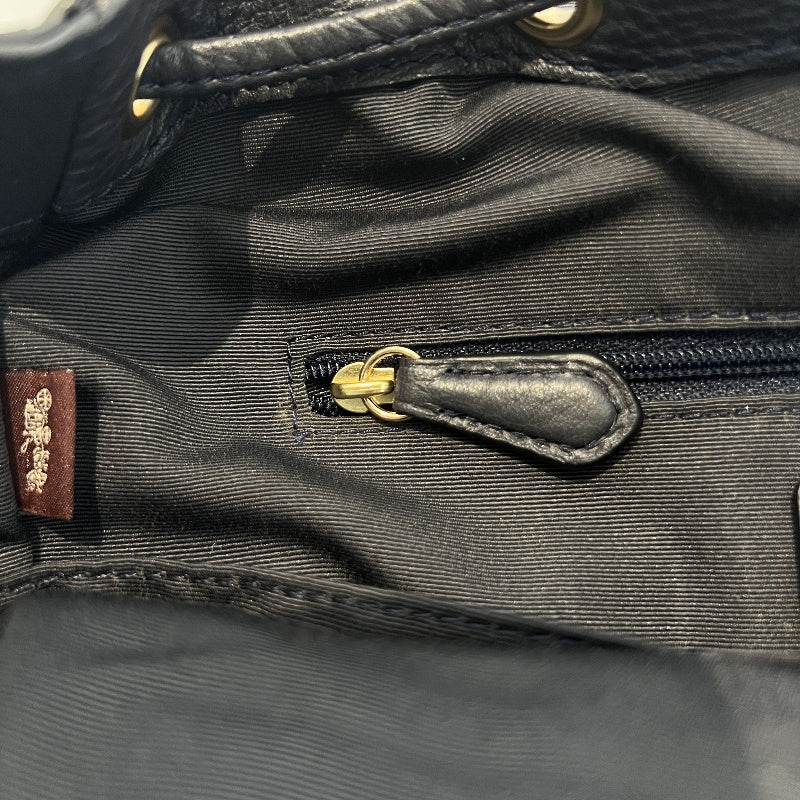 COACH Full Grain Pebbled Leather Backpack Black Calfskin Gold Hardware Front Twist Lock Pocket Spacious Casual Daily Commute Classic Design